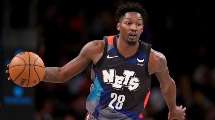 Brooklyn Nets forward Dorian Finney-Smith brings the ball up court against the New York Knicks during the fourth quarter at Barclays Center in New York City on Dec 20, 2023.